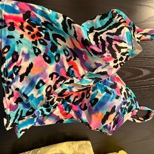 Vibrant Multicolor Women's Swimwear Top with a Black Top also